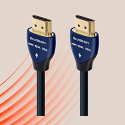 Two HDMI cables with blue connectors labelled "BLUEBERRY 4K-8K 180" are shown. Red curved lines suggest signal transmission. Neutral beige background.