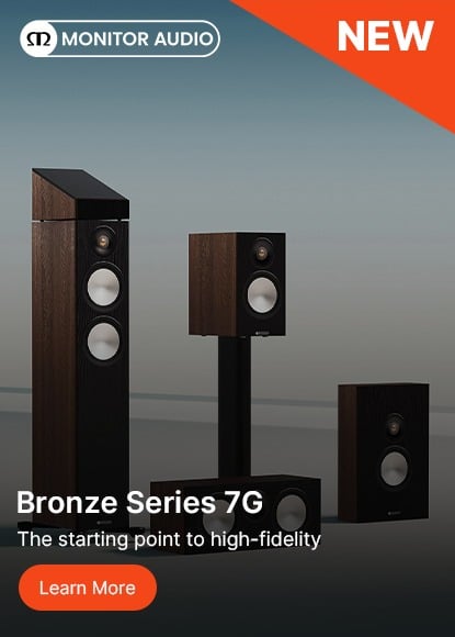 Monitor Audio ad featuring the new Bronze Series 7G speakers against a gradient background. Speakers showcased in elegant, dark wood finish.