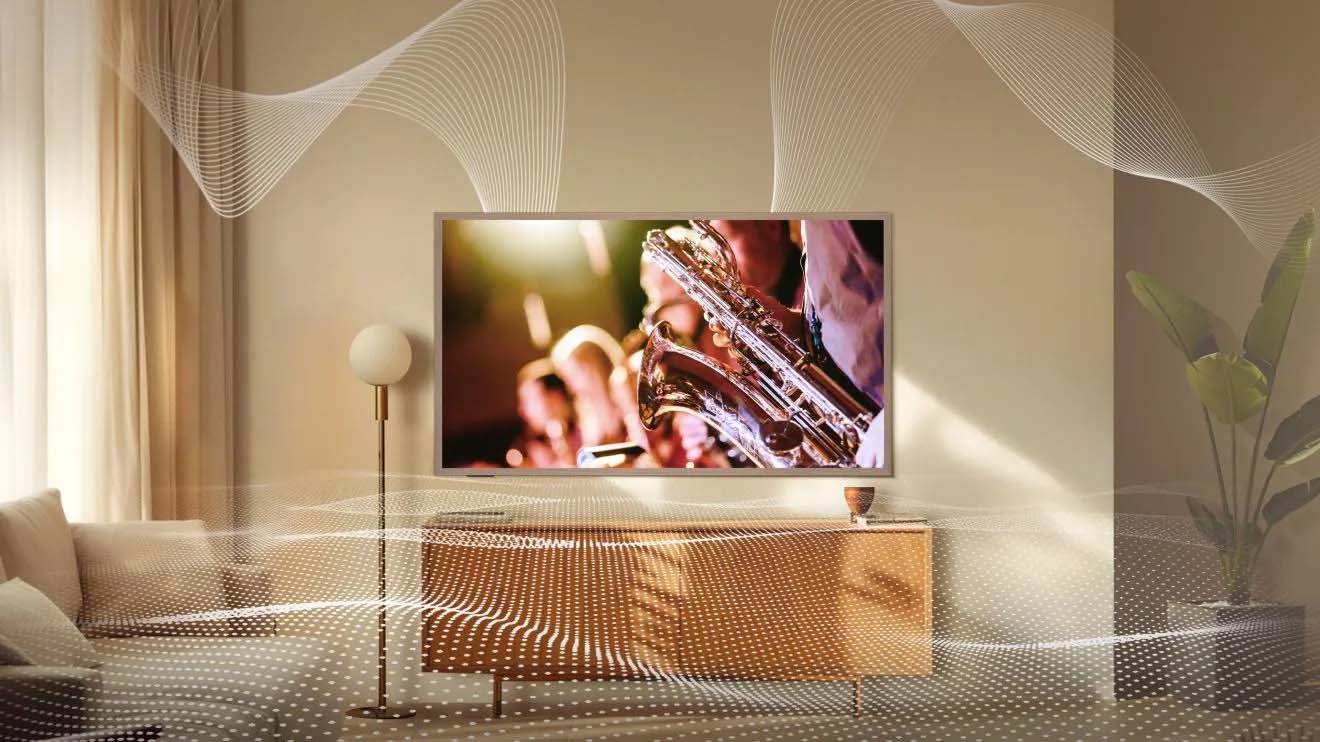 Living room featuring a wall-mounted TV, showcasing immersive 2.0.2 surround sound for movies, games, and music.