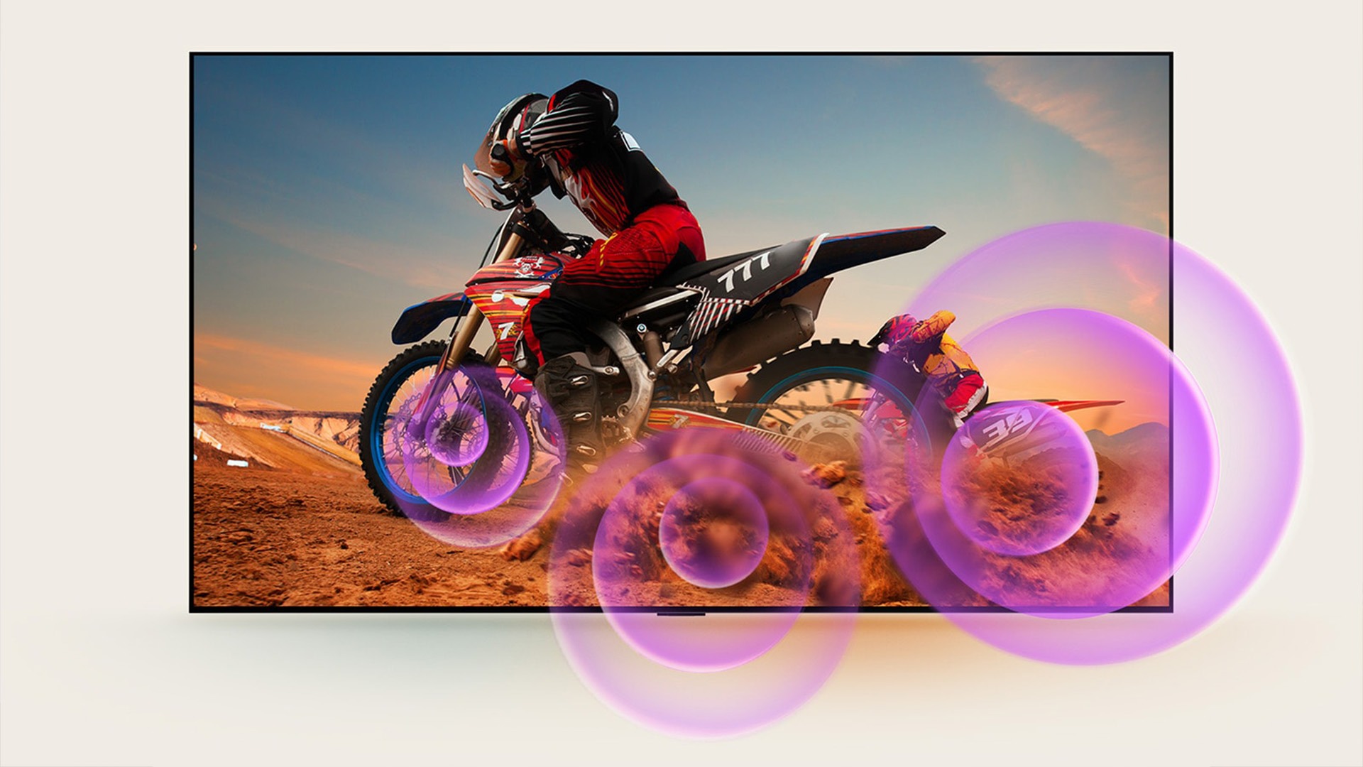 LG OLED TV depicts a man on a motorcycle with purple abstract circles coming out of the wheel to visualize sound emission.