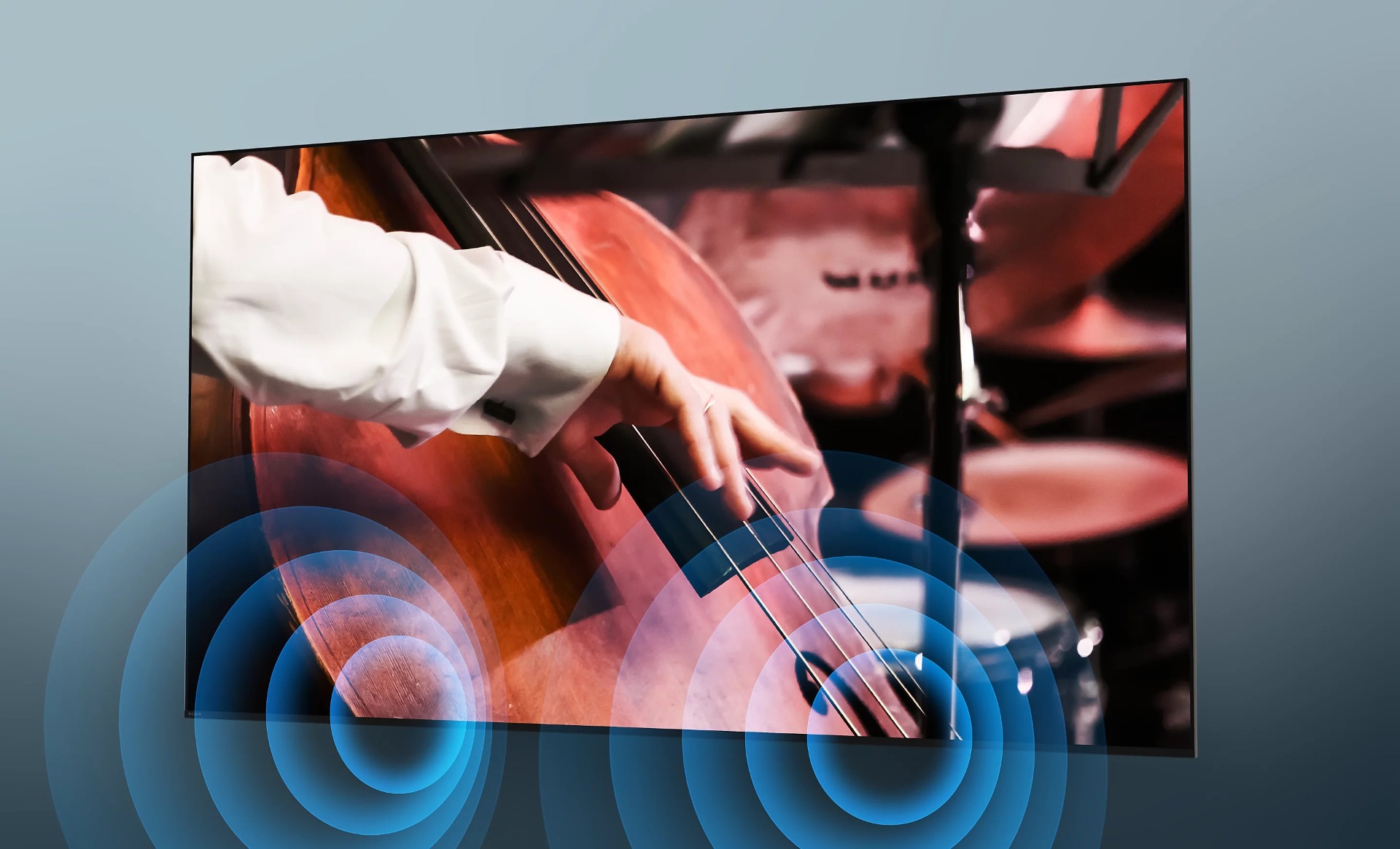 Angled view of TV with musician playing a double bass and sound waves projected from screen.