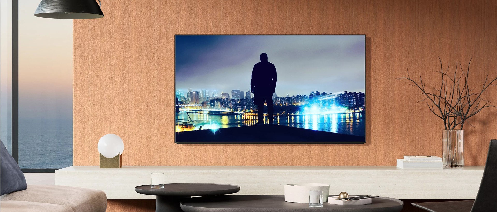Wall-mounted BRAVIA 8 II TV displayed in a modern living room.