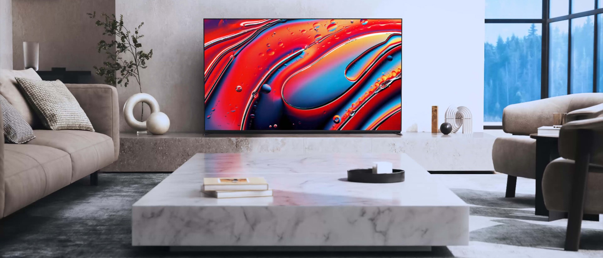 The Bravia 9 sat in a modem living room with a red colourful background showing on the TV.